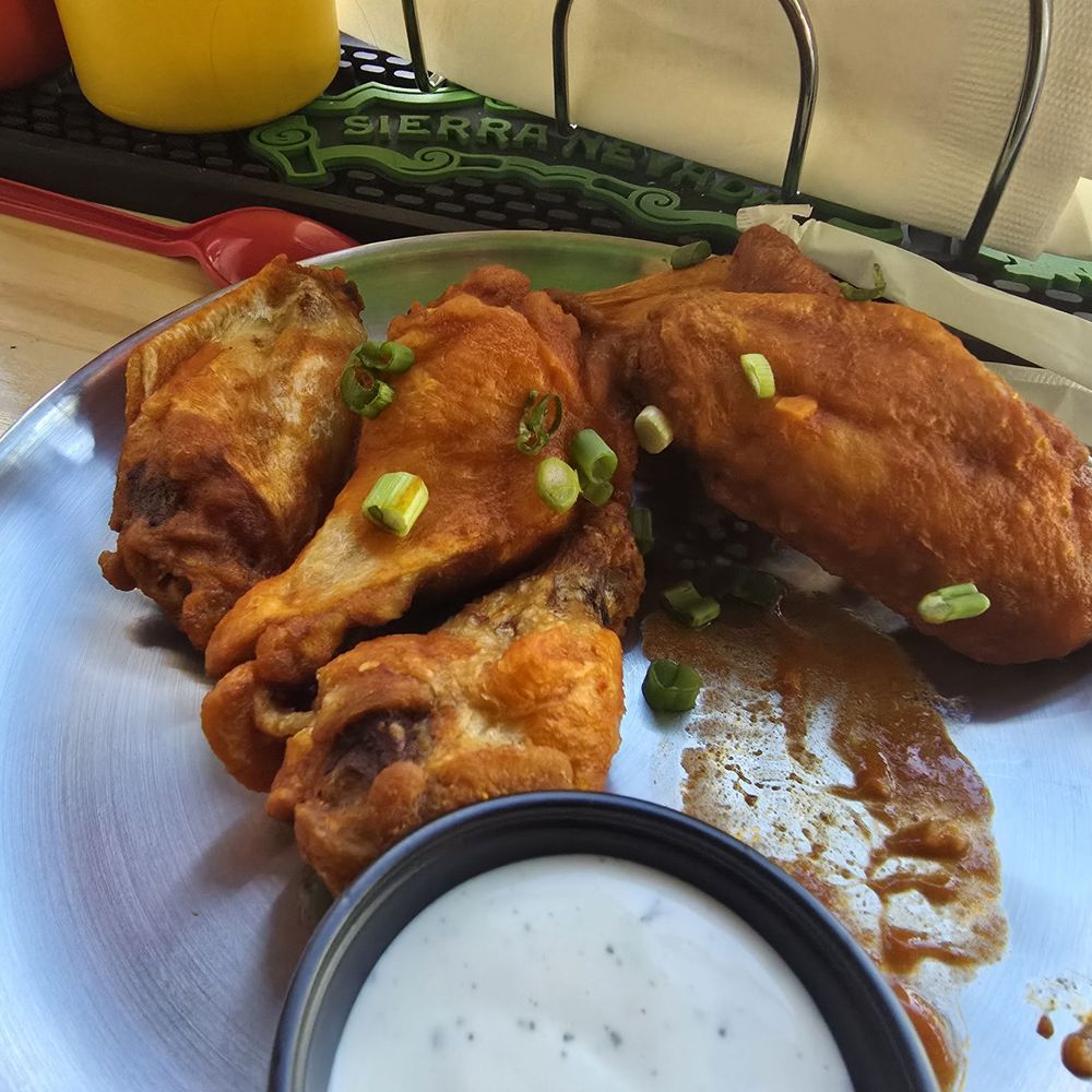 Beefy's - Zesty Garlic Buffalo Wings (There was more, some had already been eaten at this point) - Diners Near Me - Reno, Nevada Beefy's - Zesty Garlic Buffalo Wings (There was more, some had already been eaten at this point) - Diners Near Me - Reno, Nevada