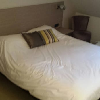 Père Benoit - Une des chambres, le tarif le moins cher - Hotels Near Me - Entzheim, 67