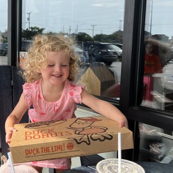 Duck Donuts - My grand baby was so happy with her donuts. - Donuts Near Me - Kill Devil Hills, North Carolina