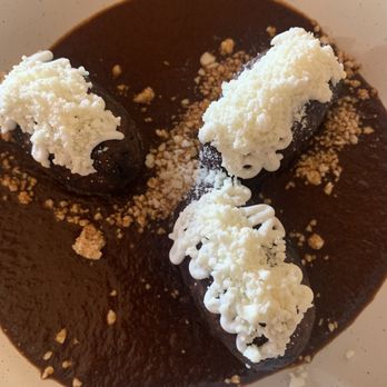 Mercado Gonzalez - MOLOTES DE PLATANO Plantain croquette, black beans puree, black mole, cotija cheese, sour cream - Mexican Near Me - Costa Mesa, California Mercado Gonzalez - MOLOTES DE PLATANO Plantain croquette, black beans puree, black mole, cotija cheese, sour cream - Mexican Near Me - Costa Mesa, California