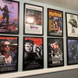Currier's Barber Shop - Classic movies you might see while getting your cut. (Another wall from inside the restroom).
