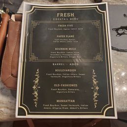 a menu on a marble table a menu on a marble table