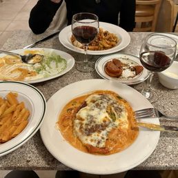 Veal Parm in a rosé sauce with penne pasta