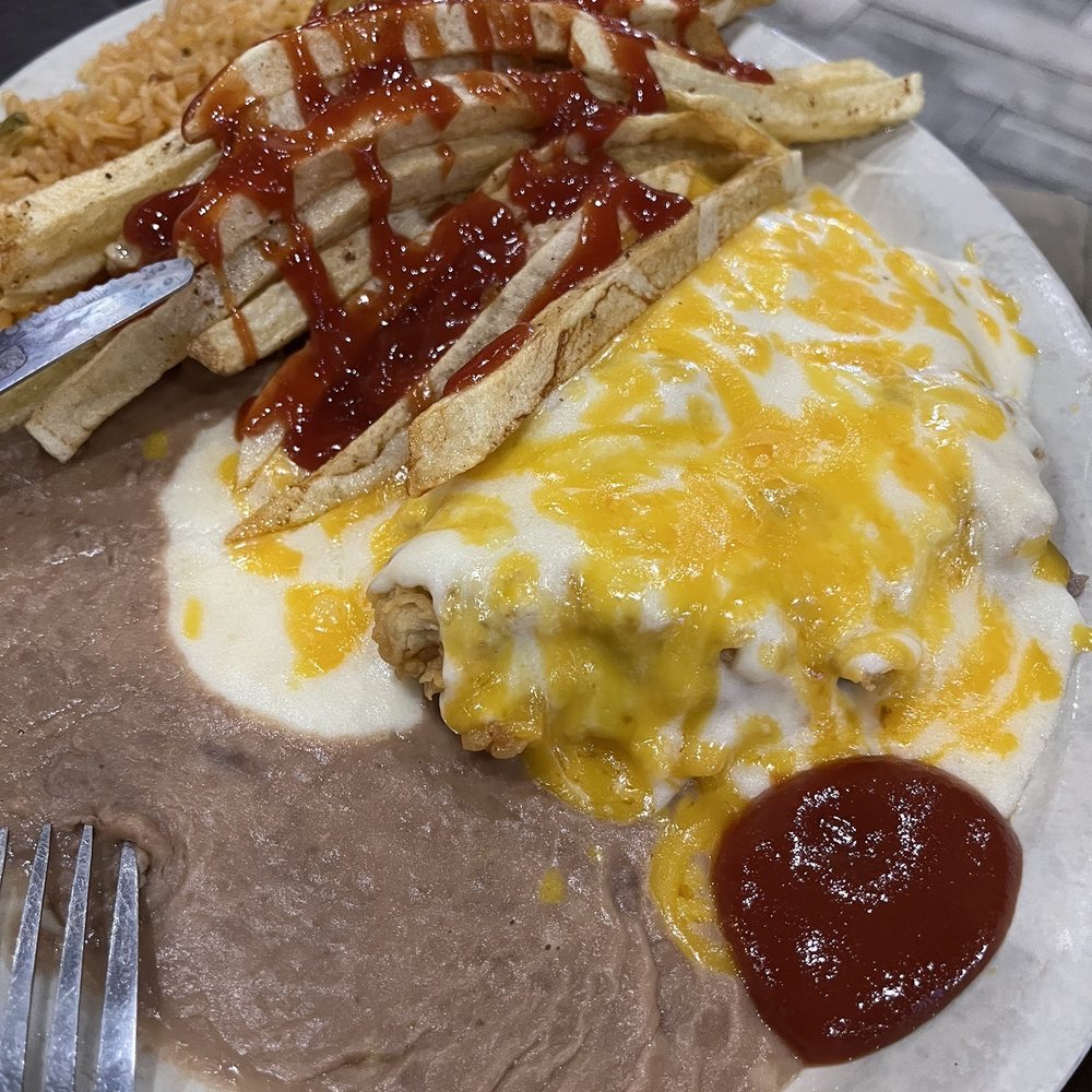 Steak House - Chicken fried steak homemade fried rice and beans (excuse the ketchup) - Mexican Near Me - Zapata, Texas Steak House - Chicken fried steak homemade fried rice and beans (excuse the ketchup) - Mexican Near Me - Zapata, Texas
