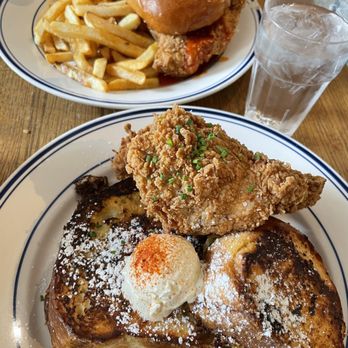 Pochos - Chicken and French toast. Background is the Hot chicken sandwich. - Breakfast & Brunch Near Me - Chicago, Illinois Pochos - Chicken and French toast. Background is the Hot chicken sandwich. - Breakfast & Brunch Near Me - Chicago, Illinois