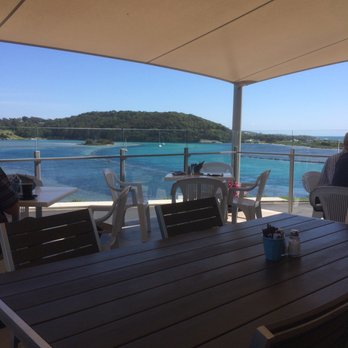 Wharf Cafe - Part of the wonderful view from the elevated open deck eating area. Great views of the Narooma harbour entrance and out across the ocean - Coffee & Tea Near Me - Narooma, NSW Wharf Cafe - Part of the wonderful view from the elevated open deck eating area. Great views of the Narooma harbour entrance and out across the ocean - Coffee & Tea Near Me - Narooma, NSW