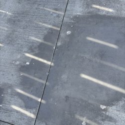 Alstra Construction - This photo is where they came back and patched, and this is what it dried and looked like nightmare