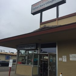 The entrance is very inviting with a parking lot on the side.