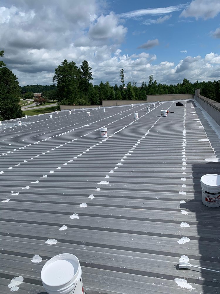 Slide of LandShark Roofing