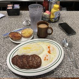 Morning grits, sausage and eggs. Coffee and water to keep you hydrated! Morning grits, sausage and eggs. Coffee and water to keep you hydrated!