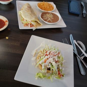 El Charro Authentic Mexican Cuisine - Sopes with sheddred chicken no refried beans and sheddred chicken with cheese burrito and side of rice and refried beans! - Mexican Near Me - Lexington, Kentucky El Charro Authentic Mexican Cuisine - Sopes with sheddred chicken no refried beans and sheddred chicken with cheese burrito and side of rice and refried beans! - Mexican Near Me - Lexington, Kentucky