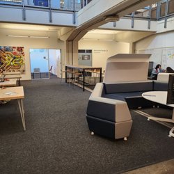 California College of the Arts - Really these tables and furnishings are left behinds from the last tenets. This refurbished build use to be a shipment storage.