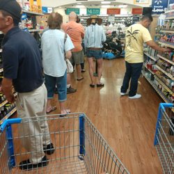 Walmart Pharmacy - One person checking people out.