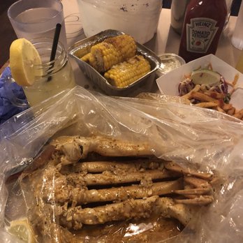 theBoil - 1lb snow crab legs in garlic butter and Old Bay sauce....corn on the side....the repeated dipping is real, y'all. - Cajun/Creole Near Me - New York, New York theBoil - 1lb snow crab legs in garlic butter and Old Bay sauce....corn on the side....the repeated dipping is real, y'all. - Cajun/Creole Near Me - New York, New York