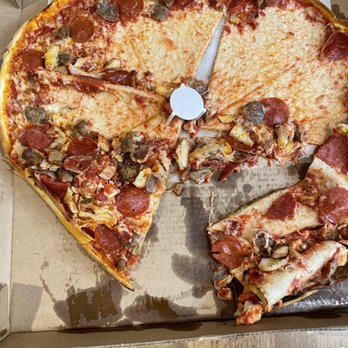 Rizzo's Pizza - Pizza was not carried straight! Came in a big heap. This was after we straighten it out! - Pizza Near Me - Astoria, New York