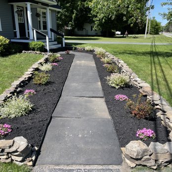 Complete Property Maintenance - a walkway leading to a home - Lawn Services Near Me