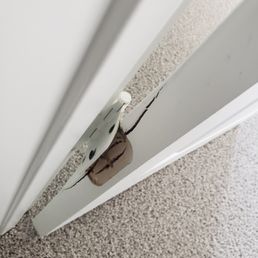 All 3 on this door looked like this. The builder said he would putty it instead of replacing the door. All 3 on this door looked like this. The builder said he would putty it instead of replacing the door.