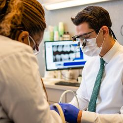 Total Health Dental Care - Dr. H. & Co. Elevating Dentistry dental operations during appointment.
