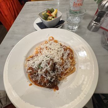 Spaghetti House - Spaghetti and Polpetine, garnished with Parmesan cheese. - Italian Near Me - London, XGL Spaghetti House - Spaghetti and Polpetine, garnished with Parmesan cheese. - Italian Near Me - London, XGL