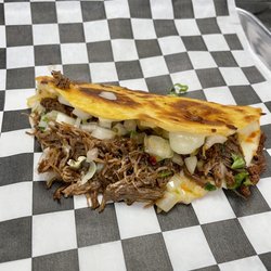 Taco Chinoz - Beef Birria taco.