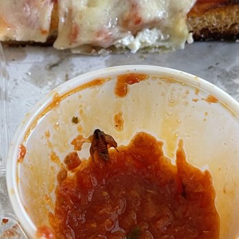 Pizza Masters - a half eaten pizza and a bowl of sauce - Pizza Near Me - Bayonne, New Jersey Pizza Masters - a half eaten pizza and a bowl of sauce - Pizza Near Me - Bayonne, New Jersey