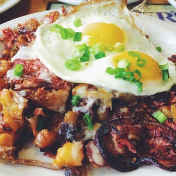 Beach Break Cafe - Corn Beef Hash and eggs on top to your liking (sunny-side up) - Breakfast & Brunch Near Me - Oceanside, California Beach Break Cafe - Corn Beef Hash and eggs on top to your liking (sunny-side up) - Breakfast & Brunch Near Me - Oceanside, California