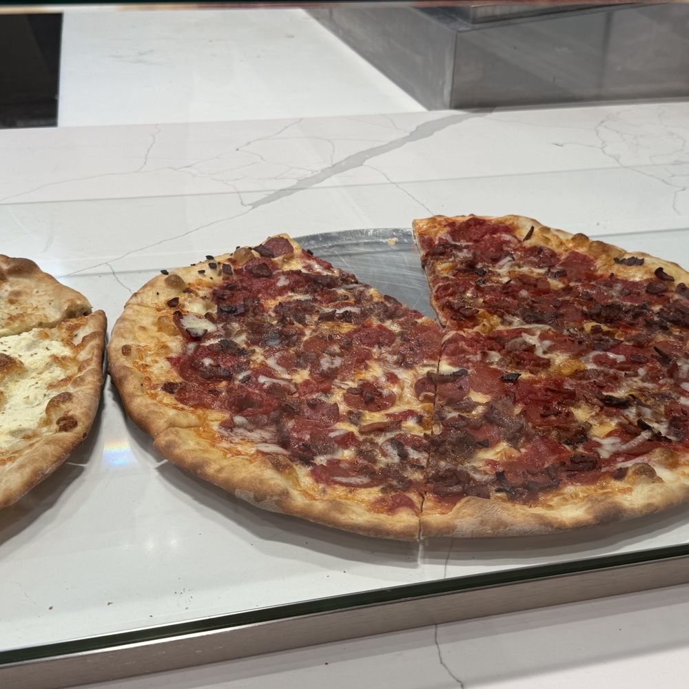 Lillo’s Tomato Pie - Meatlovers pie loaded up - Cheesesteaks Near Me - Forest Hills, New York Lillo’s Tomato Pie - Meatlovers pie loaded up - Cheesesteaks Near Me - Forest Hills, New York