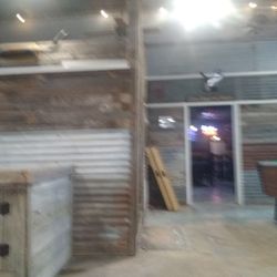 Door opens into the bar
