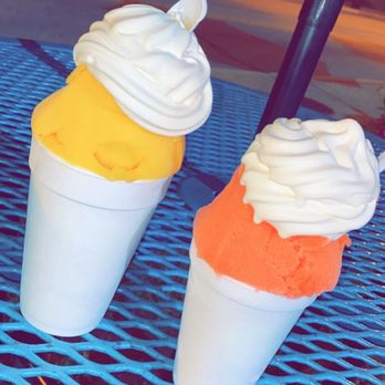 Mom's Italian Water Ice - On the right is a large mango gelati and on the left is a medium watermelon gelati. - Ice Cream & Frozen Yogurt Near Me - Hatfield, Pennsylvania Mom's Italian Water Ice - On the right is a large mango gelati and on the left is a medium watermelon gelati. - Ice Cream & Frozen Yogurt Near Me - Hatfield, Pennsylvania