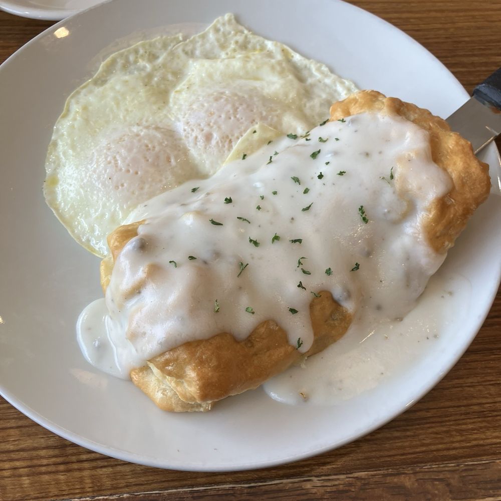 Sunny Street Cafe - Eggs and biscuit stuffed with sausage and green pepper covered with cream gravy - Breakfast & Brunch Near Me - Carrollton, Texas Sunny Street Cafe - Eggs and biscuit stuffed with sausage and green pepper covered with cream gravy - Breakfast & Brunch Near Me - Carrollton, Texas
