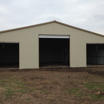 JM Portable Buildings - 48'x40' Vertical Roof and Sides, 12'x12' roll up door and two 10'x10' roll up doors, with a side door - Sheds & Outdoor Storage Near Me - Bryan, Texas JM Portable Buildings - 48'x40' Vertical Roof and Sides, 12'x12' roll up door and two 10'x10' roll up doors, with a side door - Sheds & Outdoor Storage Near Me - Bryan, Texas