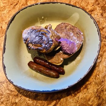 Satu'li Canteen - Cinnamon French Toast with Blueberry Cream Cheese, Passion Fruit Anglaise, and Sausage - New American Near Me - Lake Buena Vista, Florida