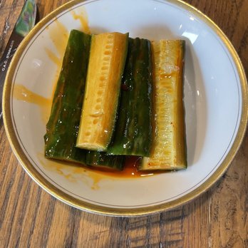 Tiger Ramen - a plate of food on a wooden table - Ramen Near Me - Falmouth, Massachusetts Tiger Ramen - a plate of food on a wooden table - Ramen Near Me - Falmouth, Massachusetts