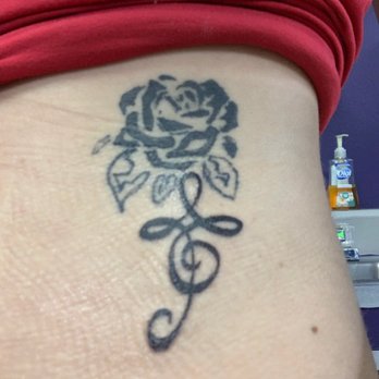 Divine Graphics Tattoo - Rib tattoo - Tattoo Near Me - Colorado Springs, Colorado Divine Graphics Tattoo - Rib tattoo - Tattoo Near Me - Colorado Springs, Colorado
