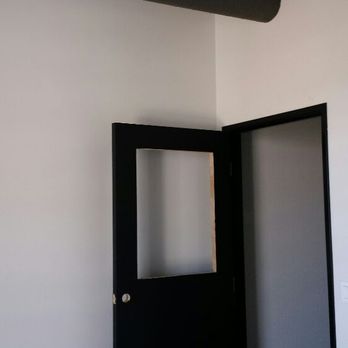 Robert Yenko Painting - Doors are stained black and coated with satin polyurethane finish. - Painters Near Me