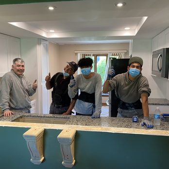 Alex Granite And Marble Works - Whew! Still smiling after lifting and moving around that granite. It is quite heavy! - Countertop Installation Near Me - Oswego, Illinois Alex Granite And Marble Works - Whew! Still smiling after lifting and moving around that granite. It is quite heavy! - Countertop Installation Near Me - Oswego, Illinois