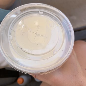 Broken Yolk Cafe - A cup of milk to go full of black stuff :( - Breakfast & Brunch Near Me - La Quinta, California