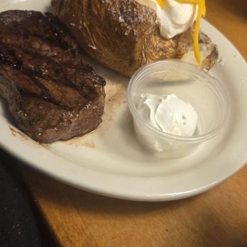 Texas Roadhouse - 6 ounce steak with loaded baked potato - American Near Me - Reno, Nevada Texas Roadhouse - 6 ounce steak with loaded baked potato - American Near Me - Reno, Nevada