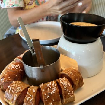 Henry's Palm Beach - Pretzel bun pigs in a blanket with fondue ! Omg this flavor combination was unexpectedly out of this world! - Bars Near Me - Palm Beach, Florida Henry's Palm Beach - Pretzel bun pigs in a blanket with fondue ! Omg this flavor combination was unexpectedly out of this world! - Bars Near Me - Palm Beach, Florida