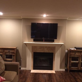 Hook Me Up Solutions - Setup the TV, sound bar, and drilled holes in our cabinets so all wires are hidden within. - Home Theatre Installation Near Me - Beaverton, Oregon