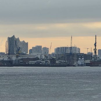 Hafencity - HafenCity in the distance from the Elbe River - Local Flavor Near Me