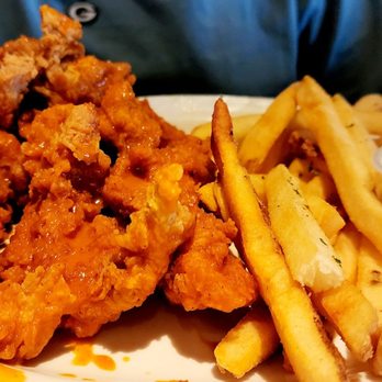 Cheddar's Scratch Kitchen - Chicken Tender Platter (No. 8 Special) tossed in buffalo sauce. - Comfort Food Near Me - Chandler, Arizona Cheddar's Scratch Kitchen - Chicken Tender Platter (No. 8 Special) tossed in buffalo sauce. - Comfort Food Near Me - Chandler, Arizona