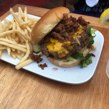 Ruby Slipper Pensacola - Burger and fries (12.00) on a Brioche bun with to die for bacon onion jam and all the fixings. The fries were pencil fries. - Breakfast & Brunch Near Me - Pensacola, Florida Ruby Slipper Pensacola - Burger and fries (12.00) on a Brioche bun with to die for bacon onion jam and all the fixings. The fries were pencil fries. - Breakfast & Brunch Near Me - Pensacola, Florida