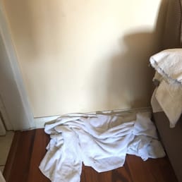 towels on the floor because the air conditioner was leaking water towels on the floor because the air conditioner was leaking water