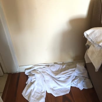 El Cajon Inn & Suites - towels on the floor because the air conditioner was leaking water - Hotels Near Me - El Cajon, California El Cajon Inn & Suites - towels on the floor because the air conditioner was leaking water - Hotels Near Me - El Cajon, California