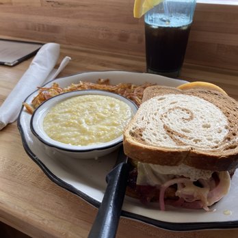 Hot Suppa - Corned beef hash sandwich with creamy grits - Breakfast & Brunch Near Me - Portland, Maine Hot Suppa - Corned beef hash sandwich with creamy grits - Breakfast & Brunch Near Me - Portland, Maine