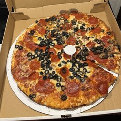 Village Pizza - Pepperoni black olive pizza half mushroom
