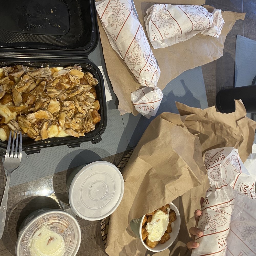 Boustan - a tray of food on a table - Middle Eastern Near Me - Montreal, Quebec Boustan - a tray of food on a table - Middle Eastern Near Me - Montreal, Quebec