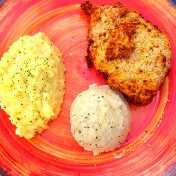 JohnnyLukes KitchenBar - Fried pork chop, creamy cheese risotto and parmesian mashed potatoes - New American Near Me - Wilmington, North Carolina JohnnyLukes KitchenBar - Fried pork chop, creamy cheese risotto and parmesian mashed potatoes - New American Near Me - Wilmington, North Carolina