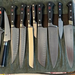 An array of forged steel German made Wusthof knives, Shun boning knife and Swedish Chef knife. An array of forged steel German made Wusthof knives, Shun boning knife and Swedish Chef knife.